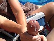 Big cumshot on the beach milf hj with semen erupting from dick