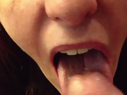 Kelly slurps a puny stream of cum ejaculated into her mouth